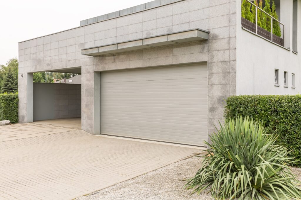 A brief guide to open a garage door with a broken spring?